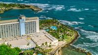 An oceanside resort hotel in the Caribbean, San Juan, Puerto Rico Aerial Stock Photos | AX101_004.0000229F