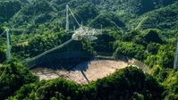The Arecibo Observatory surrounded by the Karst forest, Puerto Rico Aerial Stock Photos | AX101_094.0000000F