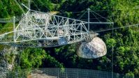 The top structure of the Arecibo Observatory, Puerto Rico  Aerial Stock Photos | AX101_099.0000000F