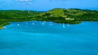 Sailboats anchored by a Caribbean island coast, Culebra, Puerto Rico Aerial Stock Photos | AX102_168.0000000F