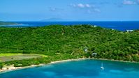 A view of hilltop and oceanfront homes in Culebra, Puerto Rico Aerial Stock Photos | AX102_170.0000000F