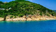 A tropical island coast in sapphire waters, Charlotte Amalie, St. Thomas Aerial Stock Photos | AX102_201.0000234F