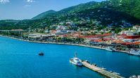 Island town and hills beside the harbor in Charlotte Amalie, St Thomas, the US Virgin Islands  Aerial Stock Photos | AX102_225.0000282F