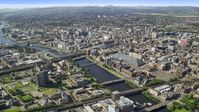 River Clyde with bridges by city buildings in Glasgow, Scotland Aerial Stock Photos | AX110_167.0000000F