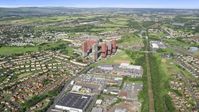 Tall apartment buildings near houses, Glasgow, Scotland Aerial Stock Photos | AX110_215.0000046F