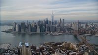 Lower Manhattan, the East River, and the Brooklyn Bridge in Autumn, New York City Aerial Stock Photos | AX120_134.0000082F
