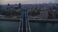 Light traffic on the Manhattan Bridge at sunset in New York City Aerial Stock Photos | AX121_041.0000083F