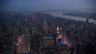 Times Square and Midtown skyscrapers with Lower Manhattan in the background at sunset, New York City Aerial Stock Photos | AX121_103.0000219F