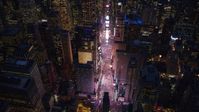 The bright lights of Times Square at night in Midtown, New York City Aerial Stock Photos | AX121_135.0000081F