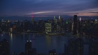 Midtown Manhattan across the East River at night in New York City Aerial Stock Photos | AX121_144.0000032F