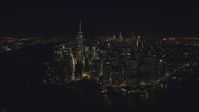 Lower Manhattan skyscrapers at night in New York City Aerial Stock Photos | AX121_193.0000103F