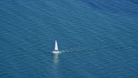 A sailing boat on Cape Cod Bay, Massachusetts Aerial Stock Photos | AX143_125.0000000