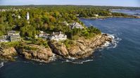Oceanfront mansions and trees with fall foliage, Manchester-by-the-Sea, Massachusetts Aerial Stock Photos | AX147_063.0000000