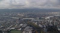 Downtown Portland, Willamette River, and convention center in Oregon Aerial Stock Photos | AX153_129.0000262F
