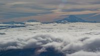 Mount Jefferson and Three Sisters Volcanoes, seen above the clouds, Cascade Range, Oregon Aerial Stock Photos | AX154_099.0000300F