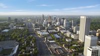 Downtown Connector along city buildings; Midtown Atlanta, Georgia Aerial Stock Photos | AX39_049.0000319F