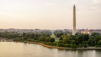 The Washington Monument and White House seen from Tidal Basin, Washington D.C., sunset Aerial Stock Photos | AXP076_000_0010F