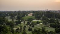 Rows of gravestones near Arlington House at Arlington National Cemetery, Arlington, Virginia, twilight Aerial Stock Photos | AXP076_000_0025F
