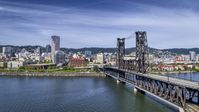 Steel Bridge and waterfront buildings in Downtown Portland, Oregon Aerial Stock Photos | DXP001_012_0001
