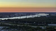 The Stan Musial Veterans Memorial Bridge and Mississippi River at sunset in St. Louis, Missouri Aerial Stock Photos | DXP001_029_0009