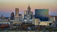 A hotel and view of the city's skyline at sunset, Downtown Indianapolis, Indiana Aerial Stock Photos | DXP001_092_0014