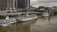 Historic riverboat docked by Downtown Louisville, Kentucky Aerial Stock Photos | DXP001_095_0016