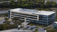 A view of a modern office building in Austin, Texas Aerial Stock Photos | DXP002_104_0010