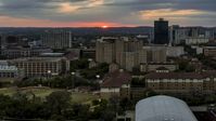 The university campus with setting sun in distance, Austin, Texas Aerial Stock Photos | DXP002_105_0014