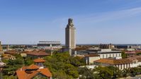 UT Tower at the University of Texas during ascent, Austin, Texas Aerial Stock Photos | DXP002_107_0005