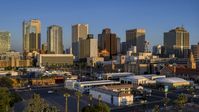 Tall buildings in the city's skyline of Downtown Phoenix, Arizona, sunset Aerial Stock Photos | DXP002_143_0005