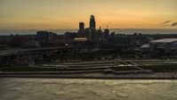The skyline at sunset, seen from the Missouri River, Downtown Omaha, Nebraska Aerial Stock Photos | DXP002_172_0013