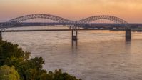 Traffic crossing the Hernando de Soto Bridge at sunset, Downtown Memphis, Tennessee Aerial Stock Photos | DXP002_181_0001
