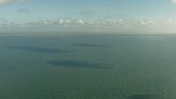 HD stock footage aerial video fly over the Gulf of Mexico to approach the Matagorda Peninsula, Texas Aerial Stock Footage | AF0001_000169