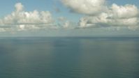 HD stock footage aerial video of a view of the Gulf of Mexico beneath the clouds Aerial Stock Footage | AF0001_000192