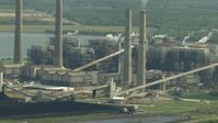 HD stock footage aerial video flyby smoke stacks and plant structures at WA Parish Generating Station by Smithers Lake, Texas Aerial Stock Footage | AF0001_000241