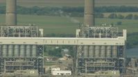 HD stock footage aerial video flyby structures at the power plant by Smithers Lake, Texas Aerial Stock Footage | AF0001_000246