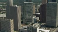 HD stock footage aerial video of flying around Downtown Houston buildings and skyscrapers, Texas Aerial Stock Footage | AF0001_000272