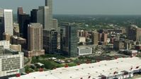 HD stock footage aerial video flyby skyscrapers to reveal the convention center, Minute Maid Park, and the 59 freeway, Downtown Houston, Texas Aerial Stock Footage | AF0001_000274