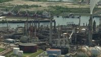 HD stock footage aerial video pan across a riverfront oil refinery in Harrisburg, Manchester, Texas Aerial Stock Footage | AF0001_000280