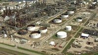 HD stock footage aerial video orbit oil refinery buildings and tanks in Harrisburg, Manchester, Texas Aerial Stock Footage | AF0001_000282
