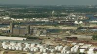 HD stock footage aerial video of flyby an oil tanker and refineries around Buffalo Bayou in Harrisburg, Manchester, Texas Aerial Stock Footage | AF0001_000284