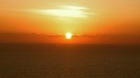 HD stock footage aerial video of a bright sunrise over the Gulf of Mexico Aerial Stock Footage | AF0001_000342