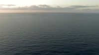HD stock footage aerial video of flying low over the Gulf of Mexico at sunrise Aerial Stock Footage | AF0001_000349
