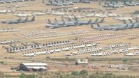 HD stock footage aerial video of an aircraft boneyard at Davis Monthan AFB, Tucson, Arizona Aerial Stock Footage | AF0001_000852