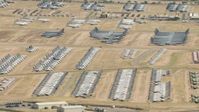 HD stock footage aerial video of an aircraft boneyard with military planes at Davis Monthan AFB, Tucson, Arizona Aerial Stock Footage | AF0001_000855