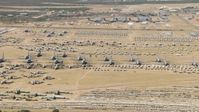 HD stock footage aerial video of airplanes at the base's aircraft boneyard, Davis Monthan AFB, Tucson, Arizona Aerial Stock Footage | AF0001_000866