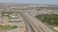 HD stock footage aerial video of Bridge of the Americas and Bowie High School sports fields, El Paso/Juarez Border Aerial Stock Footage | AF0001_000933