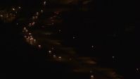 4K stock footage aerial video tilting up from Glenn Highway, Anchorage, Alaska, night Aerial Stock Footage | AK0001_0206