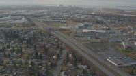 4K stock footage aerial video following Glenn Highway, approach Merrill Field and Downtown Anchorage, Alaska Aerial Stock Footage | AK0001_0581