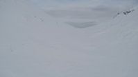 4K stock footage aerial video snowy ridge, Knik Arm of the Cook Inlet, Palmer Slough, Chugach Mountains, Alaska Aerial Stock Footage | AK0001_0769